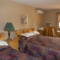 Motel Unit #2 has two queen beds and a sofabed.