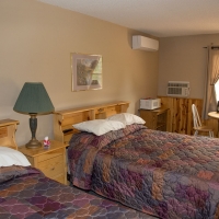Motel Unit #2 has two queen beds and a sofabed.